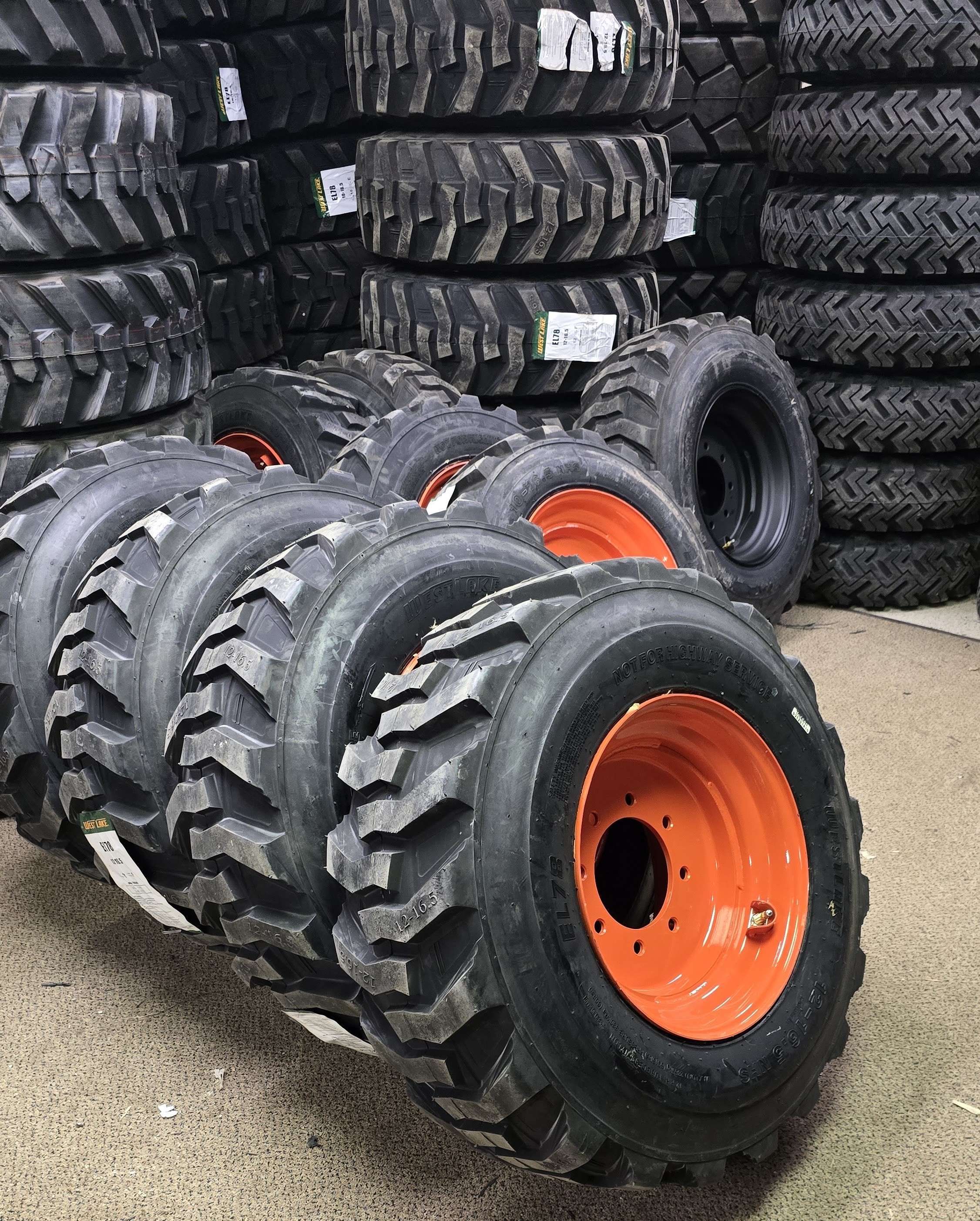 Pneumatic skid steer tire and wheel options