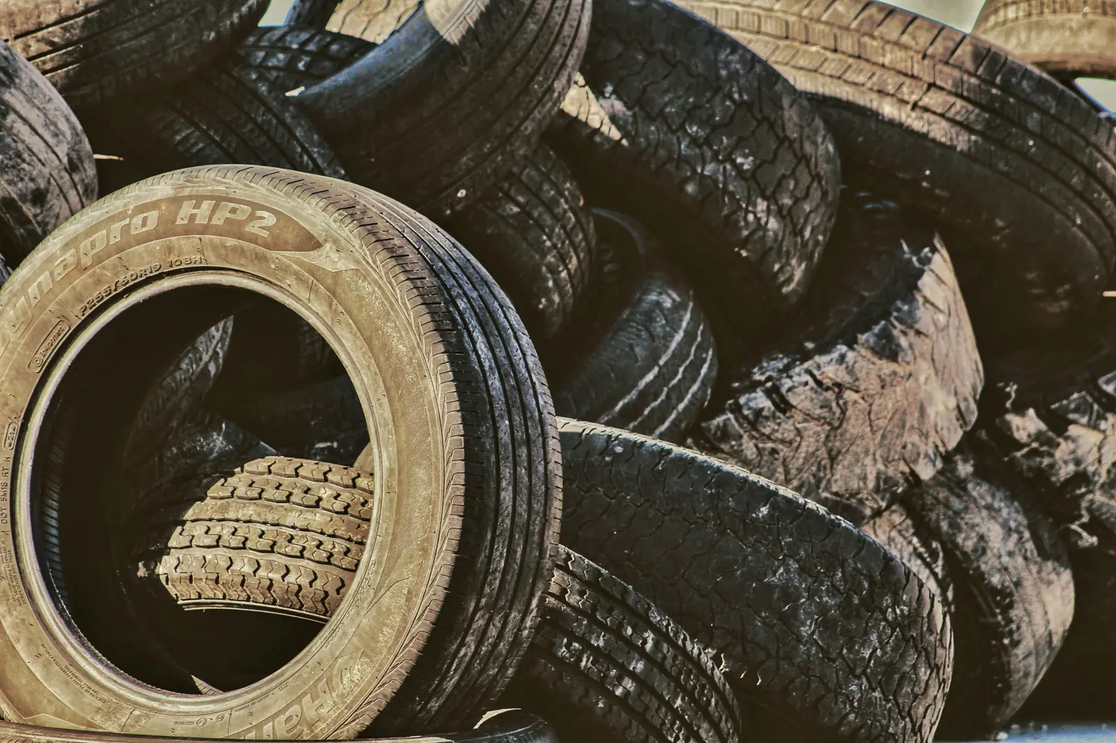 CFI Tire Service team handling used tires for recycling
